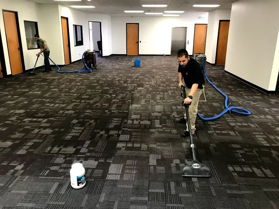 Water damage crew setting up drying equipment in a North Hollywood Arts District storefront