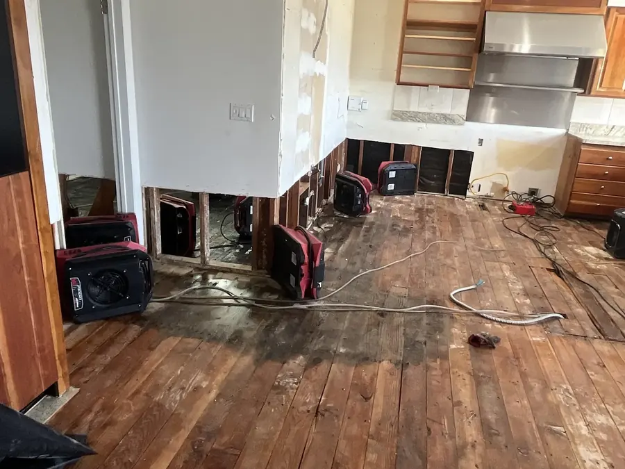 Water damaged hardwood floor being dried in the Valley