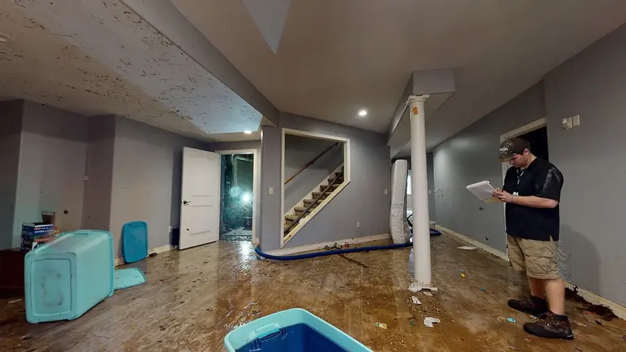 Water-stained ceiling and wet attic in a North Hollywood home after a winter storm